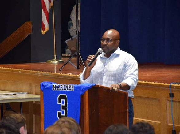 Description: Football Star, And Alumnus, Visits Long Beach High School